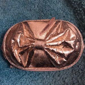NWT Victoria’s Secret gold bow makeup bag